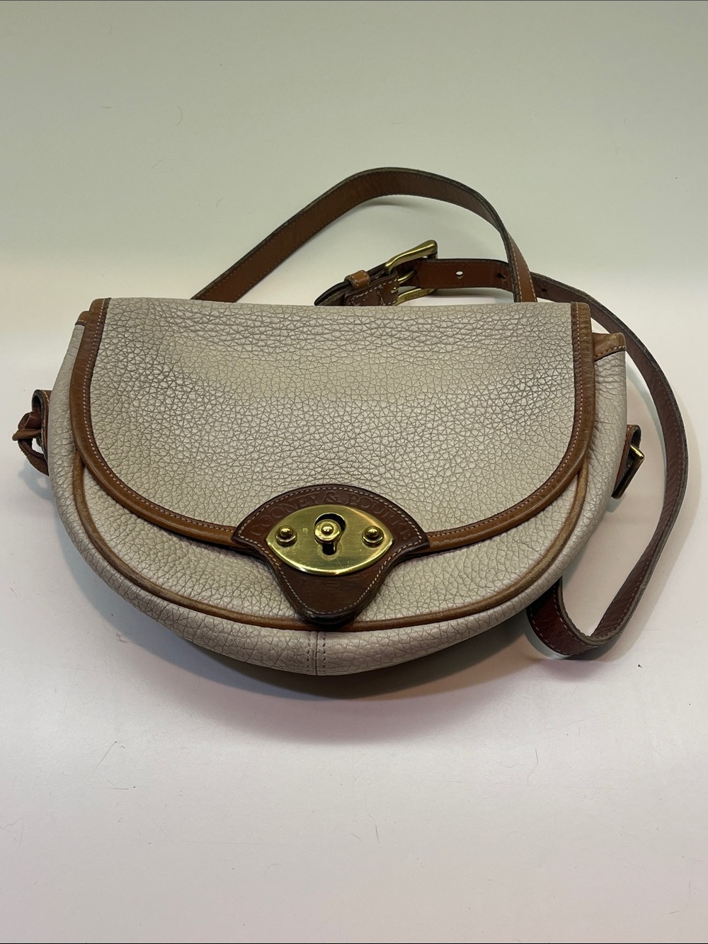 VTG Dooney & Bourke Cream and Brown All Weather Leather Crossbody Saddle Bag